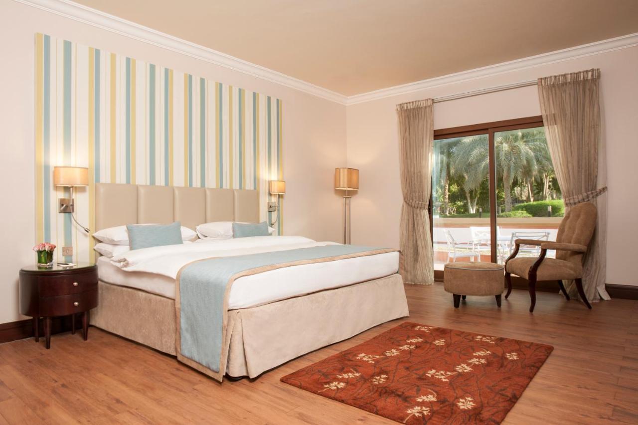 Danat Al Ain Resort Luaran gambar A bedroom at the hotel